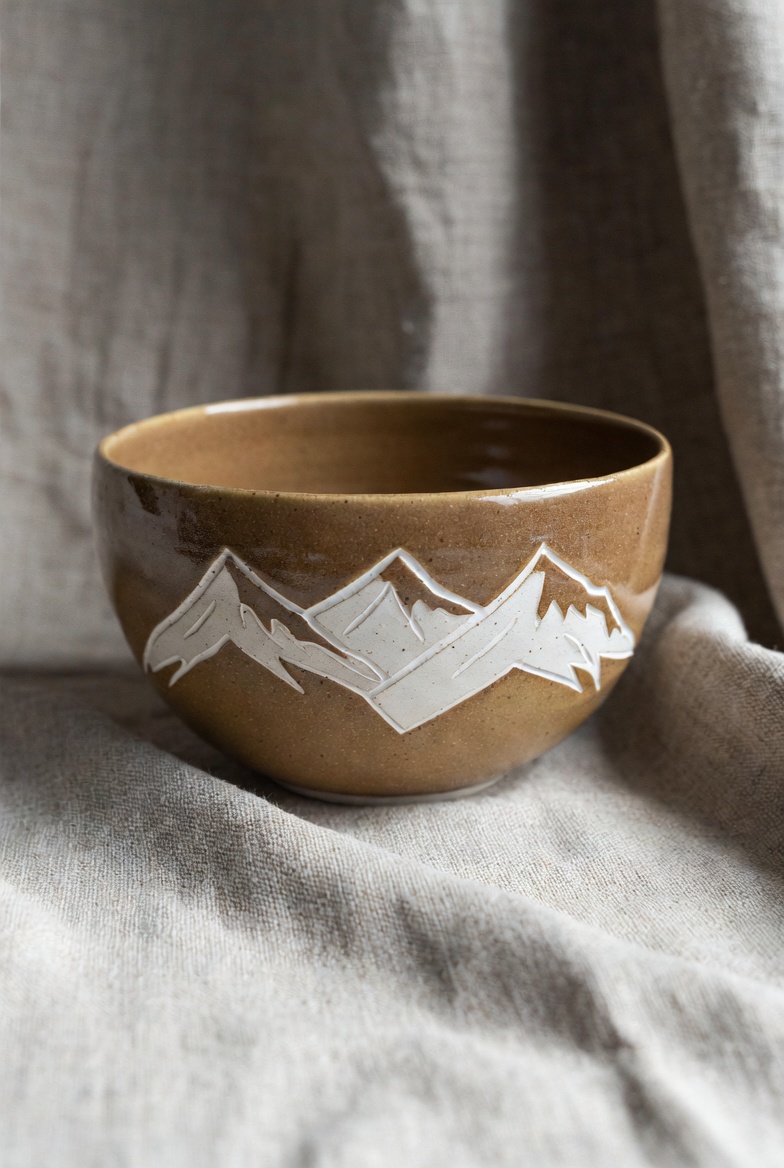 Hand-thrown ceramic unity bowl with mountain design